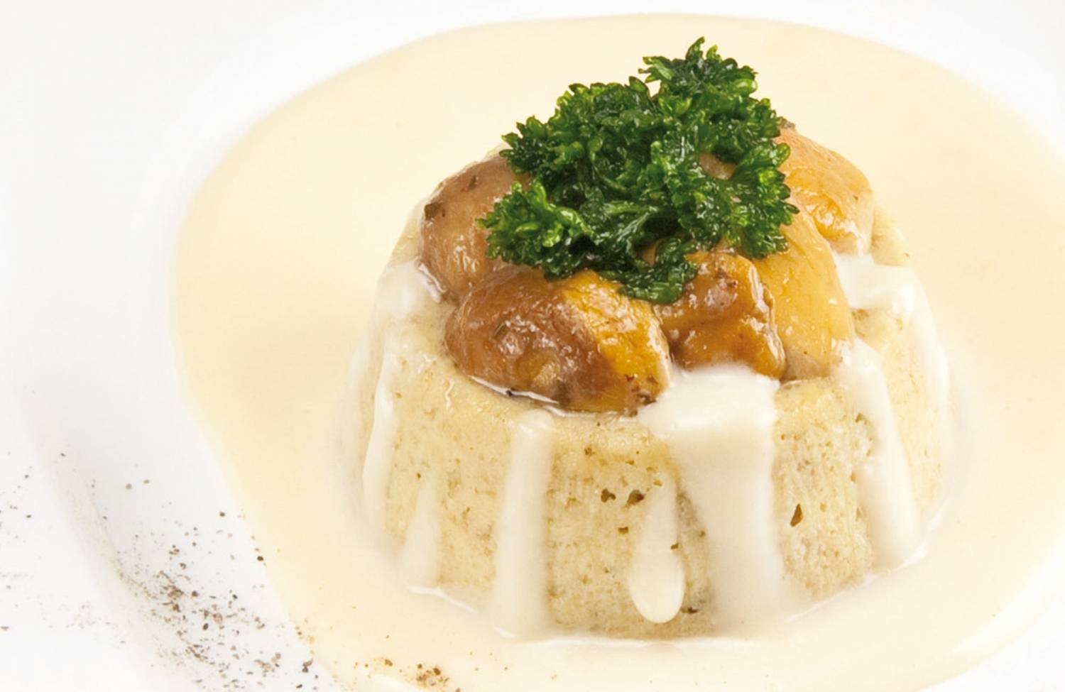 Porcini mushroom tortino with four cheeses cream